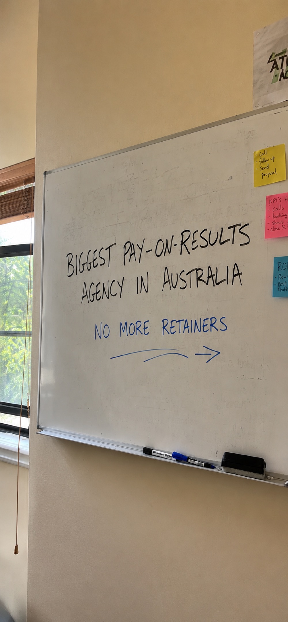 Whiteboard on Isaac's office wall: Biggest pay-on-results agency in Australia - no more retainers