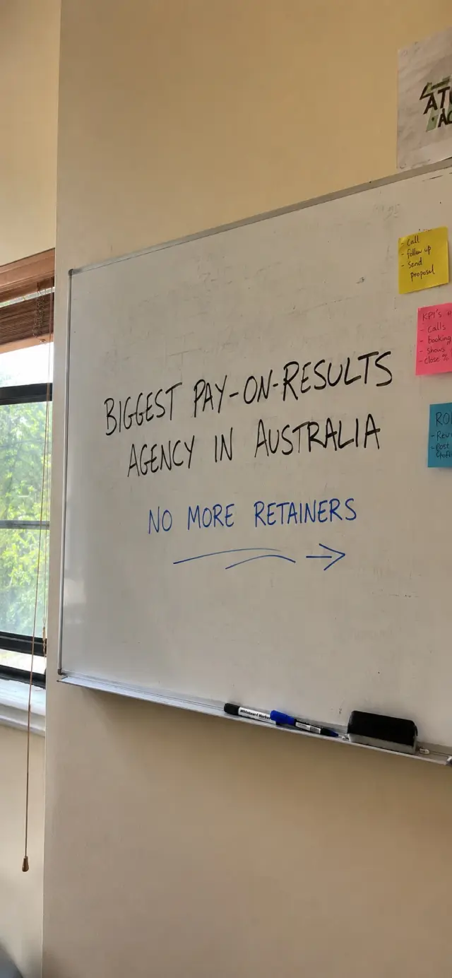 Whiteboard on Isaac's office wall: Biggest pay-on-results agency in Australia - no more retainers
